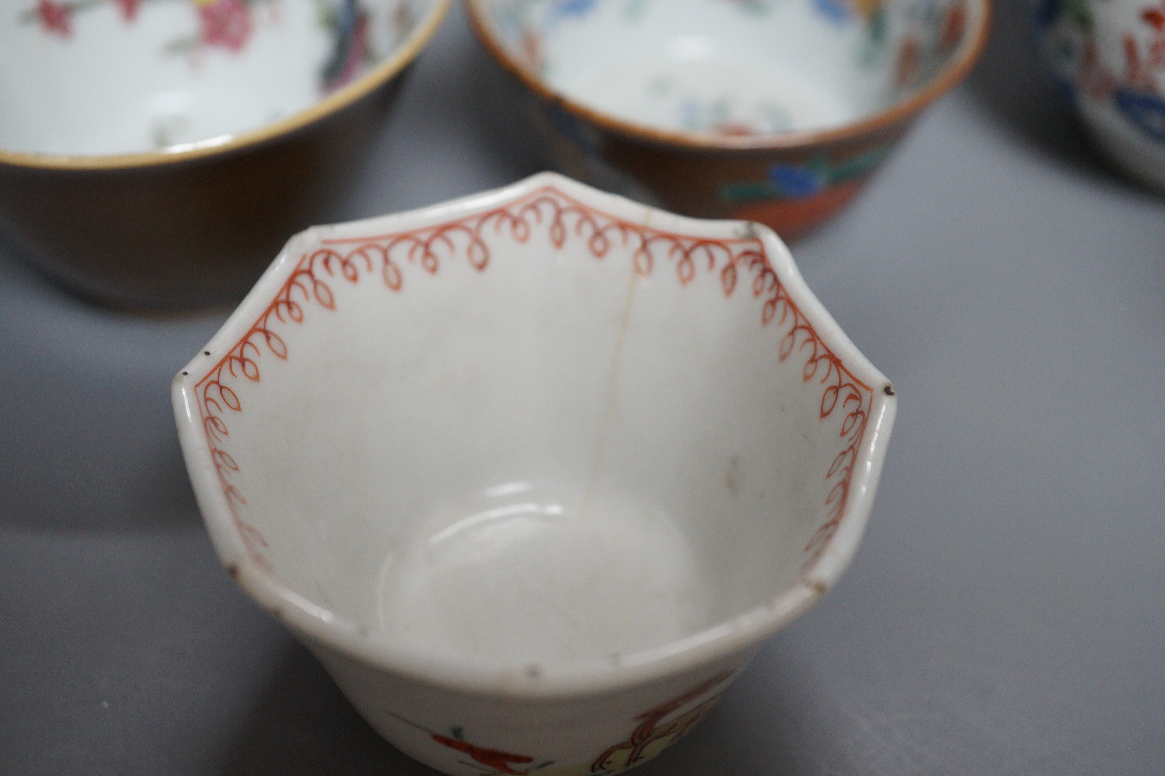 Three Chinese export famille rose cream jugs, one with pierced cover and three small bowls, 18th century and later